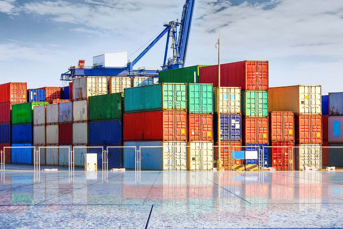 Stacked shipping containers at a port terminal
